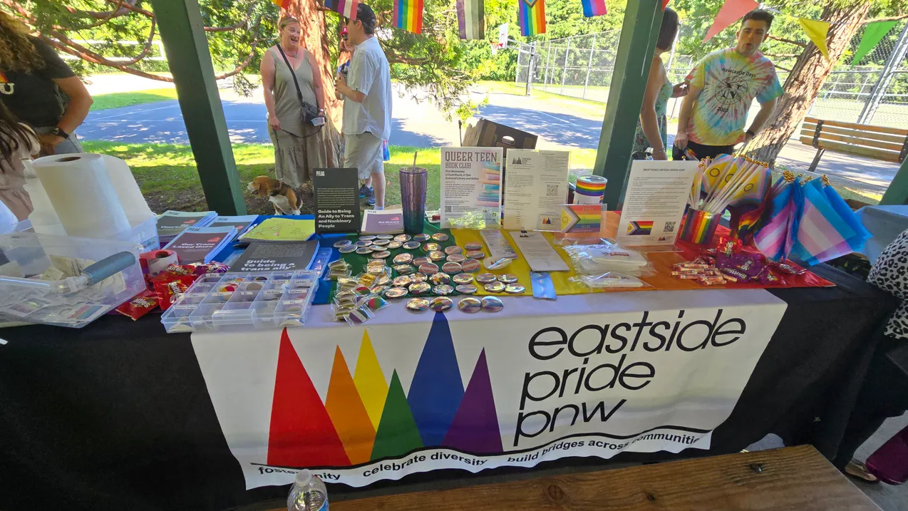 A colorful Pride banner displayed at the event