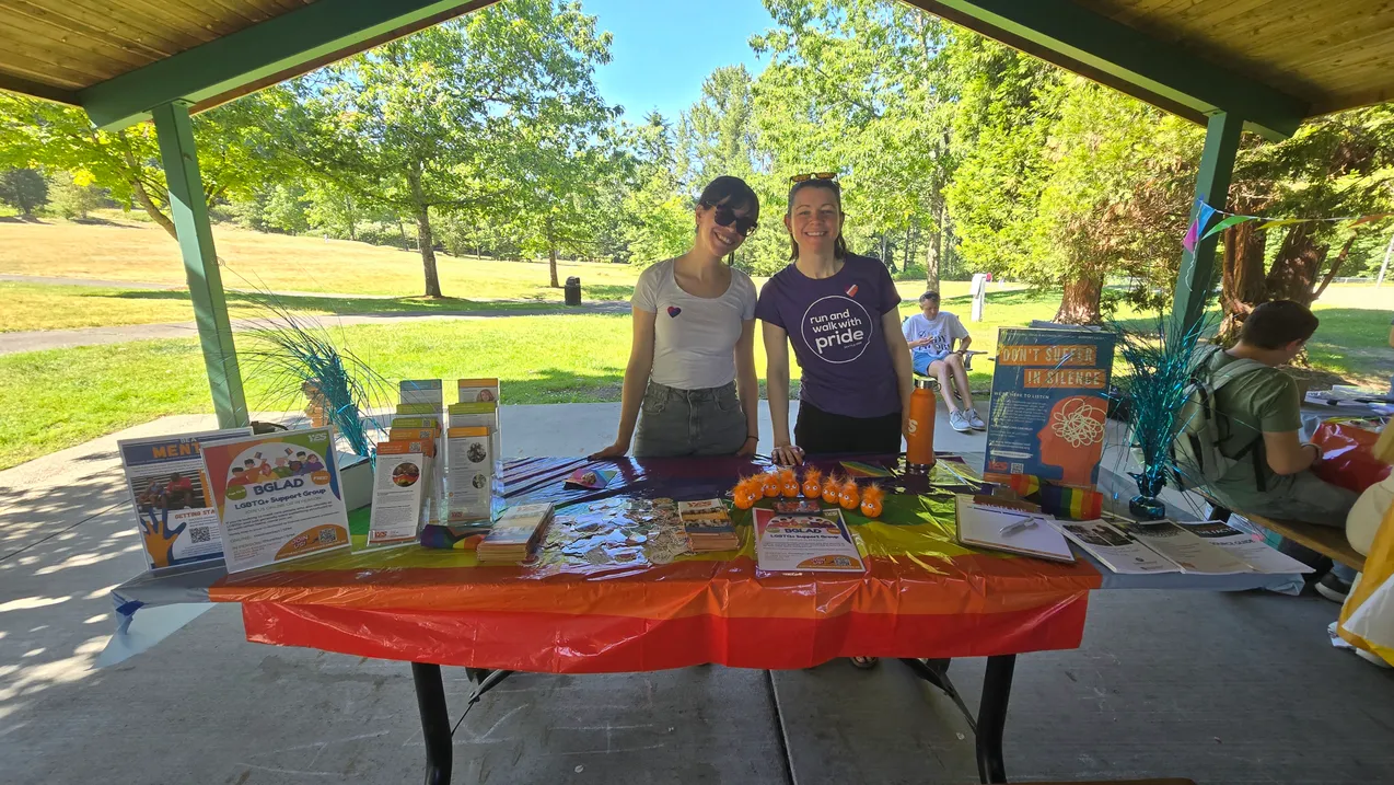 A colorful Pride banner displayed at the event
